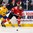 BUFFALO, NEW YORK - DECEMBER 30: Switzerland's Tim Berni #21 and Sweden's Linus Lindstrom #16 chase the puck during the preliminary round of the 2018 IIHF World Junior Championship. (Photo by Andrea Cardin/HHOF-IIHF Images)

